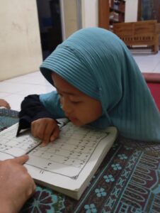 membaca al qur'an